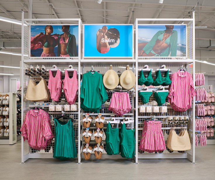 display of pink and green women's swim suits