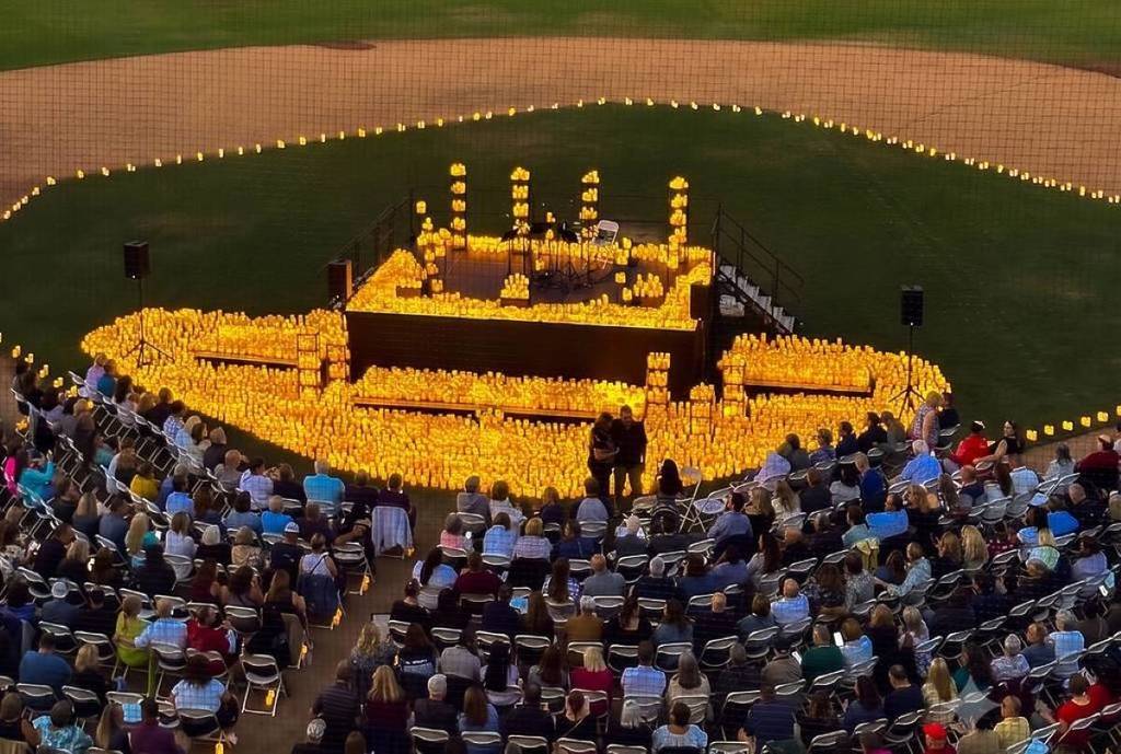 image shows outdoor candlelight concert in detroit