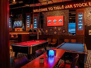 Watch ICC Men T20 World Cup at Tiger Bar Stock Exchange