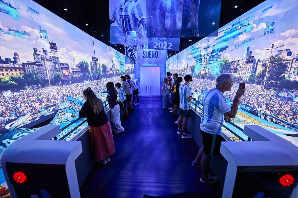 Guests at The Messi Experience using cutting edge technology to learn more about the iconic football player's life