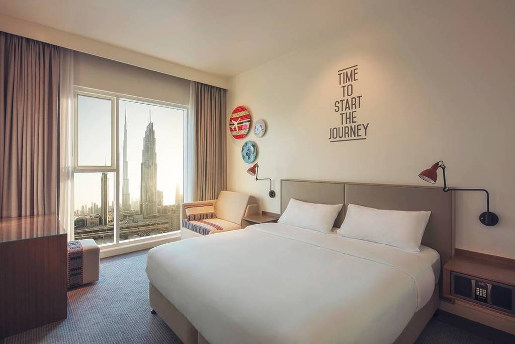 Interior shot of bedroom in Rove Hotels Downtown Dubai