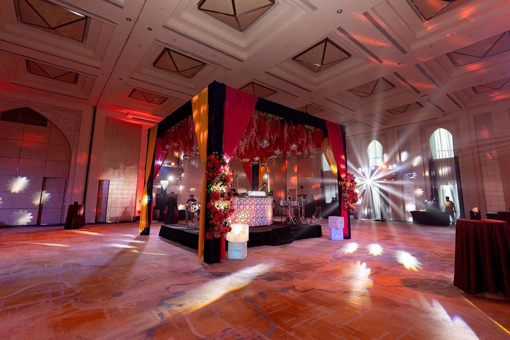 DJ booth deocrated to look like a Indian wedding altar at Farzi Sangeet