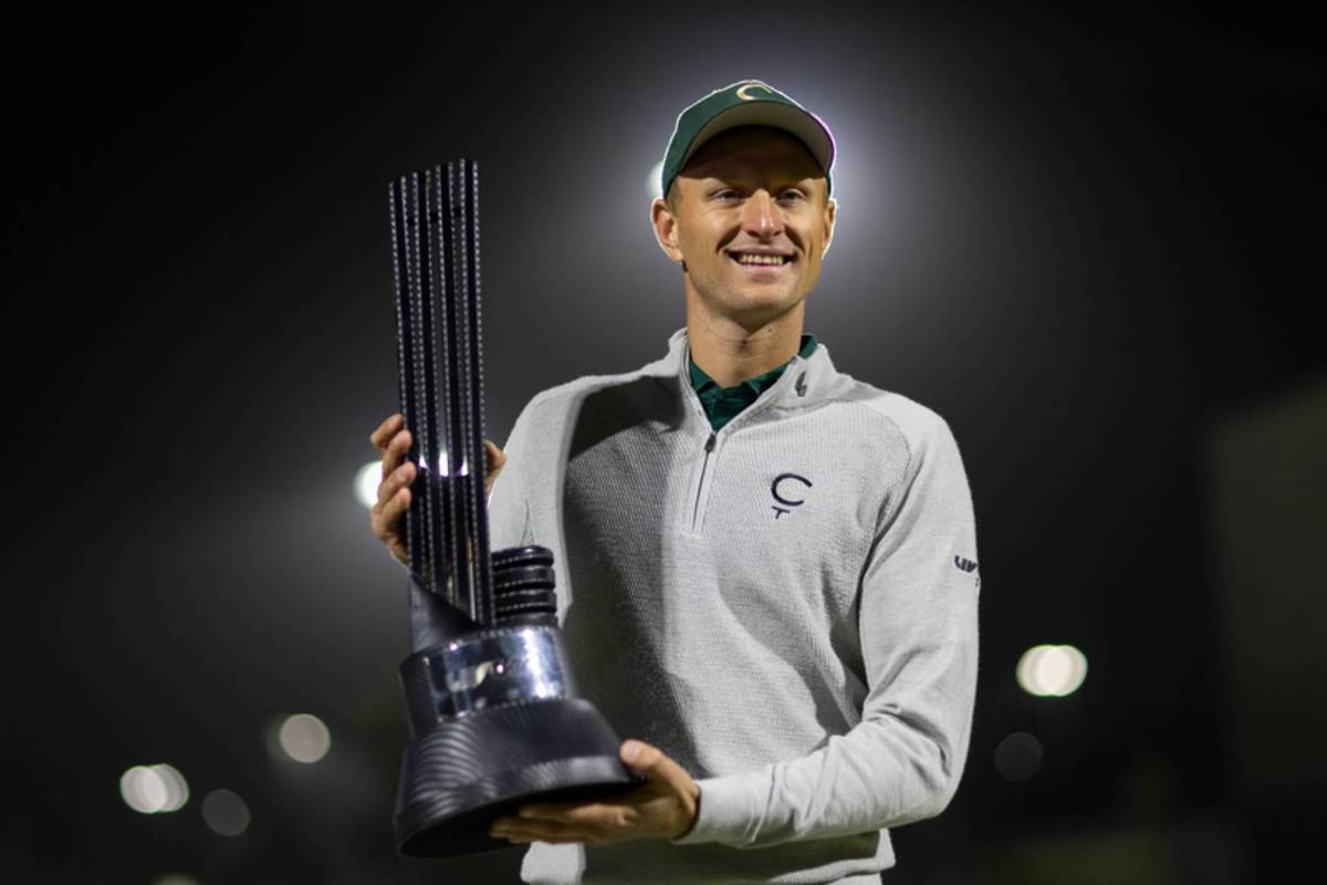 1st place individual champion, Adrian Meronk of Cleeks GC poses for a photo with the individual champion trophy after the final round of LIV Golf Riyadh presented by ROSHN Group at Riyadh Golf Club