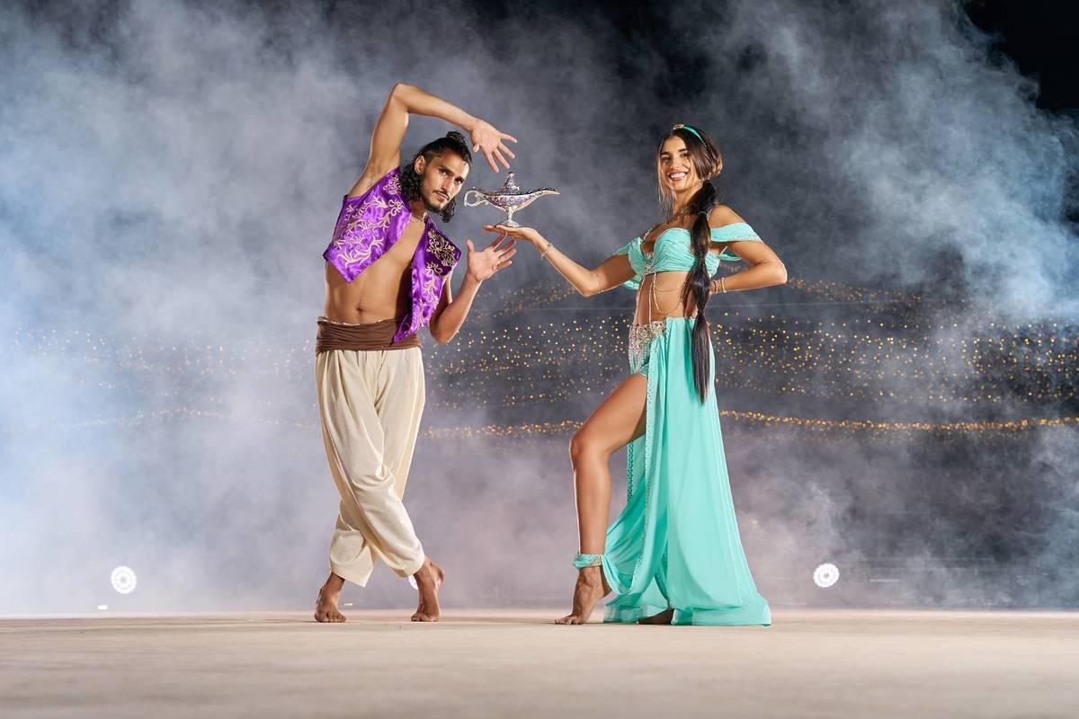Two performers dressed up as Aladdin and Jasmine