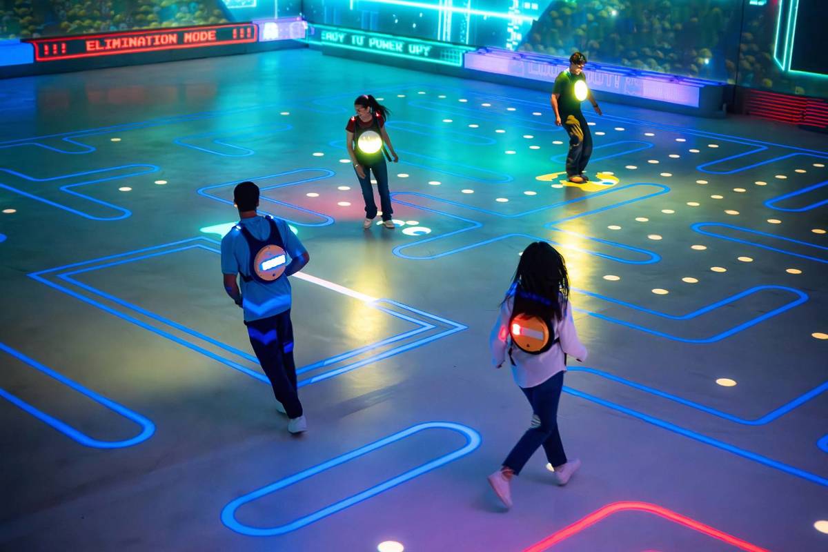 Players navigating the Pac-Man Live Experience Maze, one of the more active experiences during the school holidays