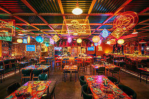 Thai Food, Neon Lights, and Busker-Style Spirit: This Lively Eatery Is Bringing Bangkok To Dubai's Streets