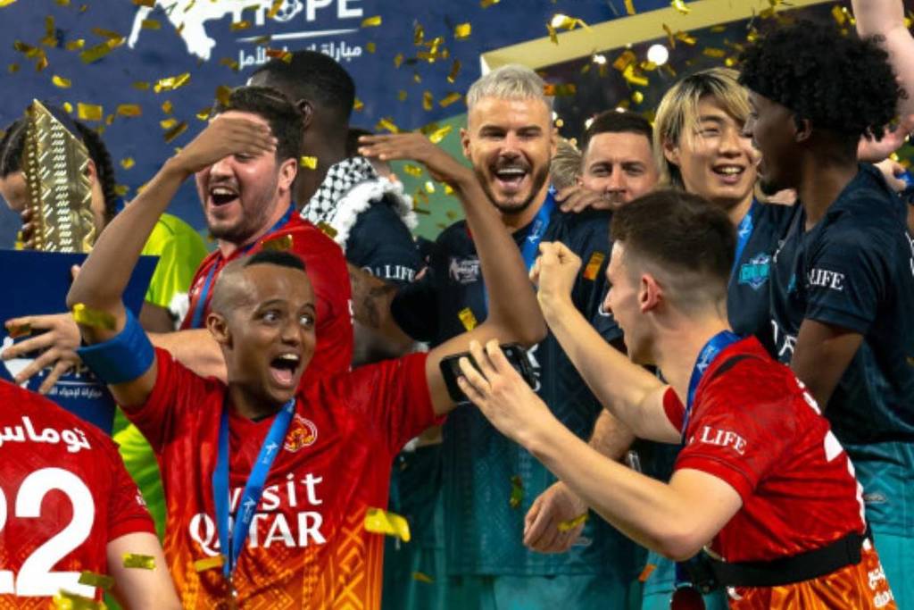 AboFlah celebrating a win with his team