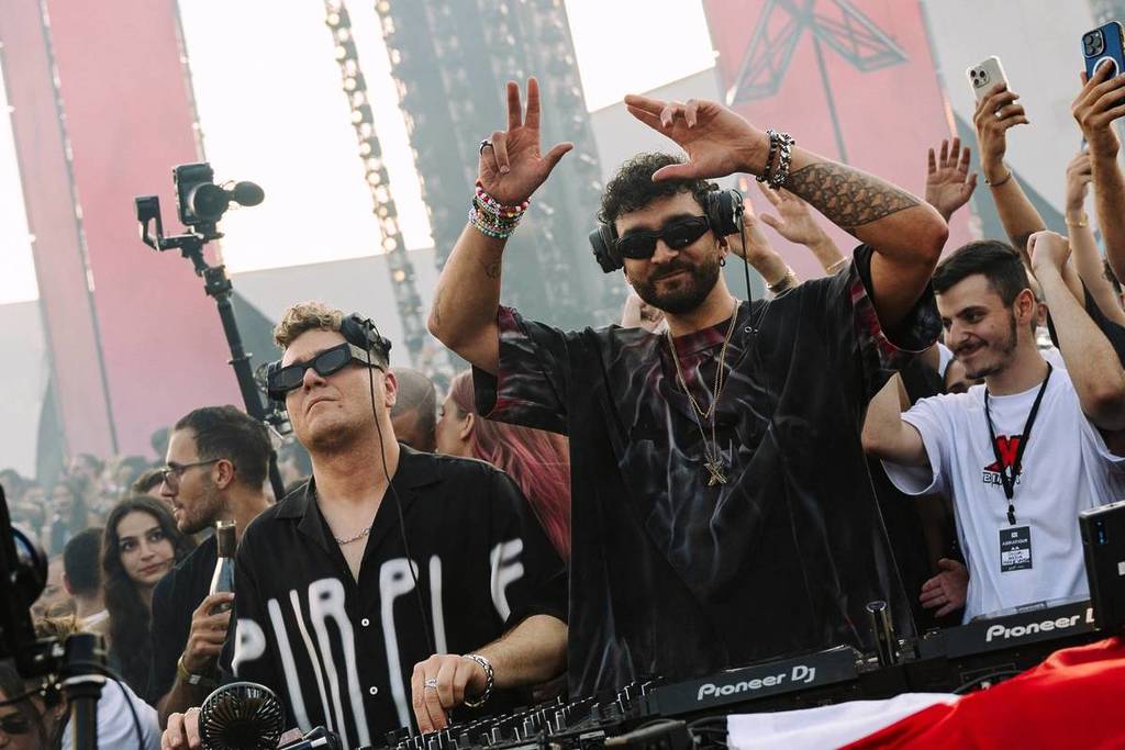 Adriatique performing one of their legendary sets in front of an energetic crowd