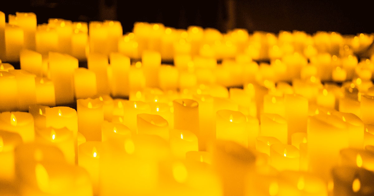 Close up of a sea of candles