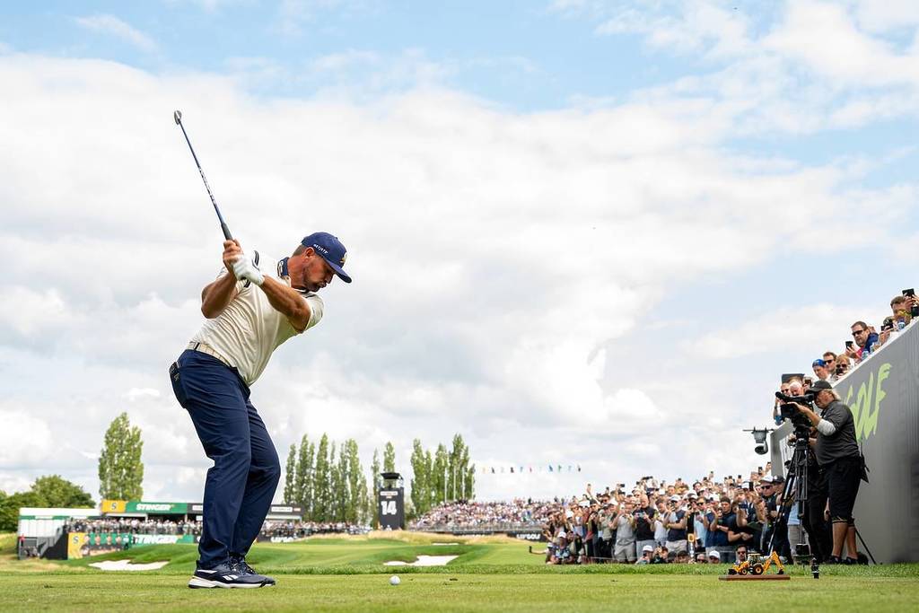 Captain Bryson DeChambeau of Crushers GC hits his shot from the 14th tee during the second round of LIV Golf United Kingdom at JCB Golf & Country Club on Saturday, July 26, 2025 in Rocester, England.