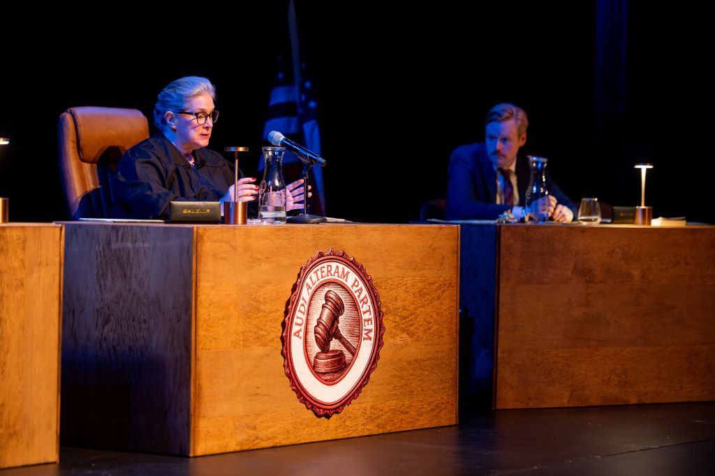 judge sits behind her desk at the jury experience