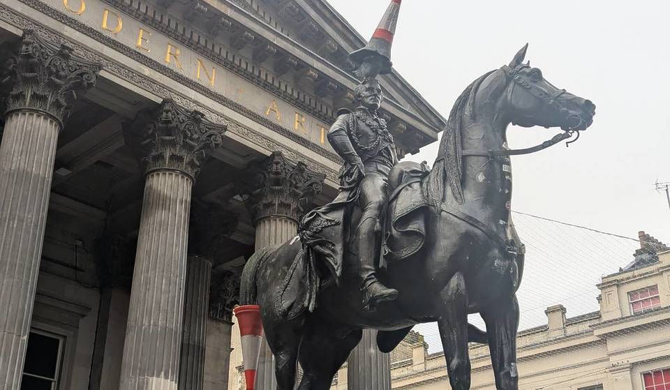 The Famous Cone On The Duke Of Wellington Statue Has Now Been Put Back On The New Pigeon Reading A Newspaper