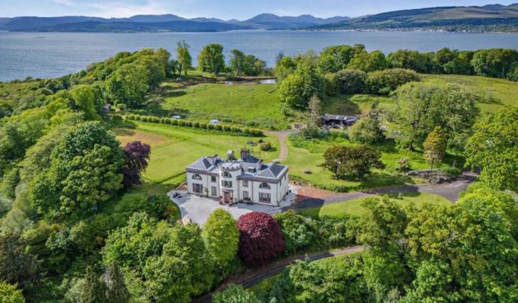 The six-bedroom mansion on its own private peninsula with stables, 22 acres, and a 16th-century tower for sale 55 minutes from Glasgow for £635,000