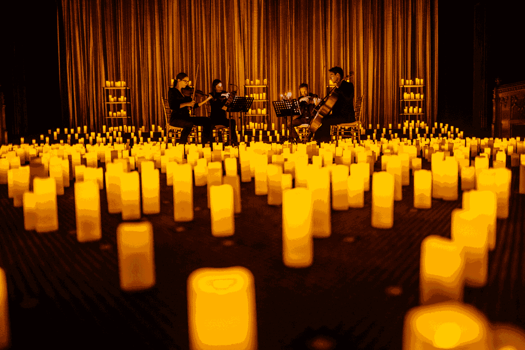 A string quartet performing on stage at a Candlelight concert