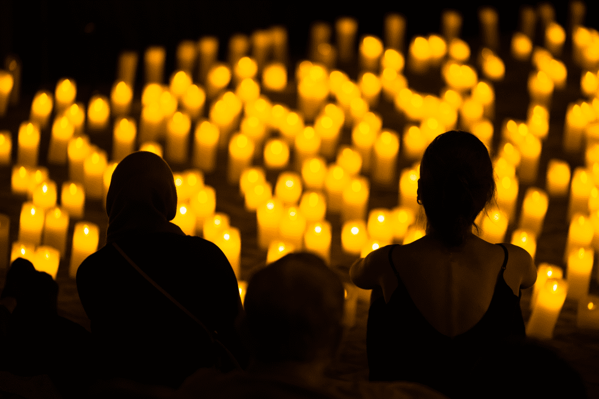 The backs of audiences at a Candlelight concert
