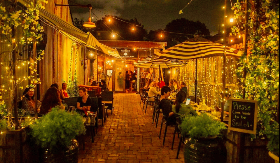 This Twinkly Euro-Inspired Courtyard And Wine Garden Is A True Hidden Gem