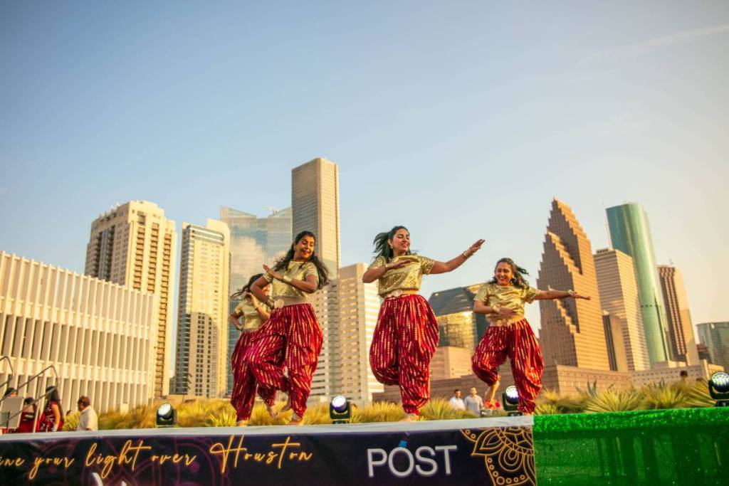 Image shows people dancing at the Skylawn of POST.