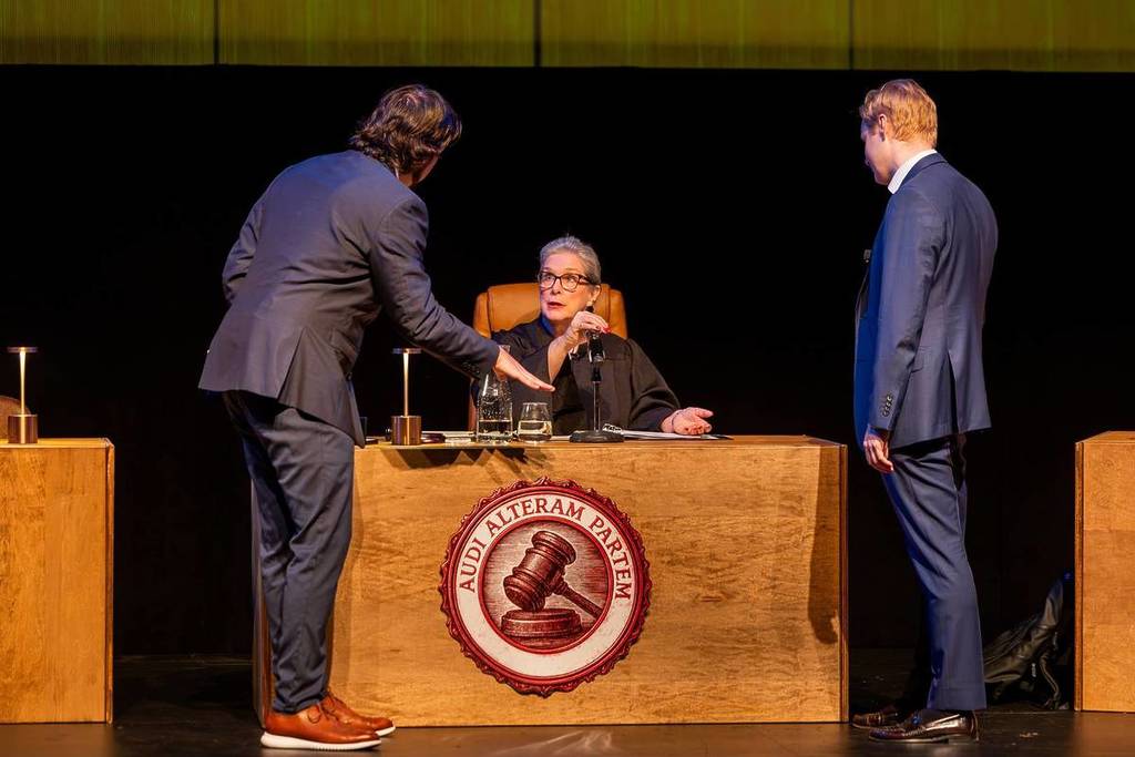 Two attorneys approaching the judge's bench