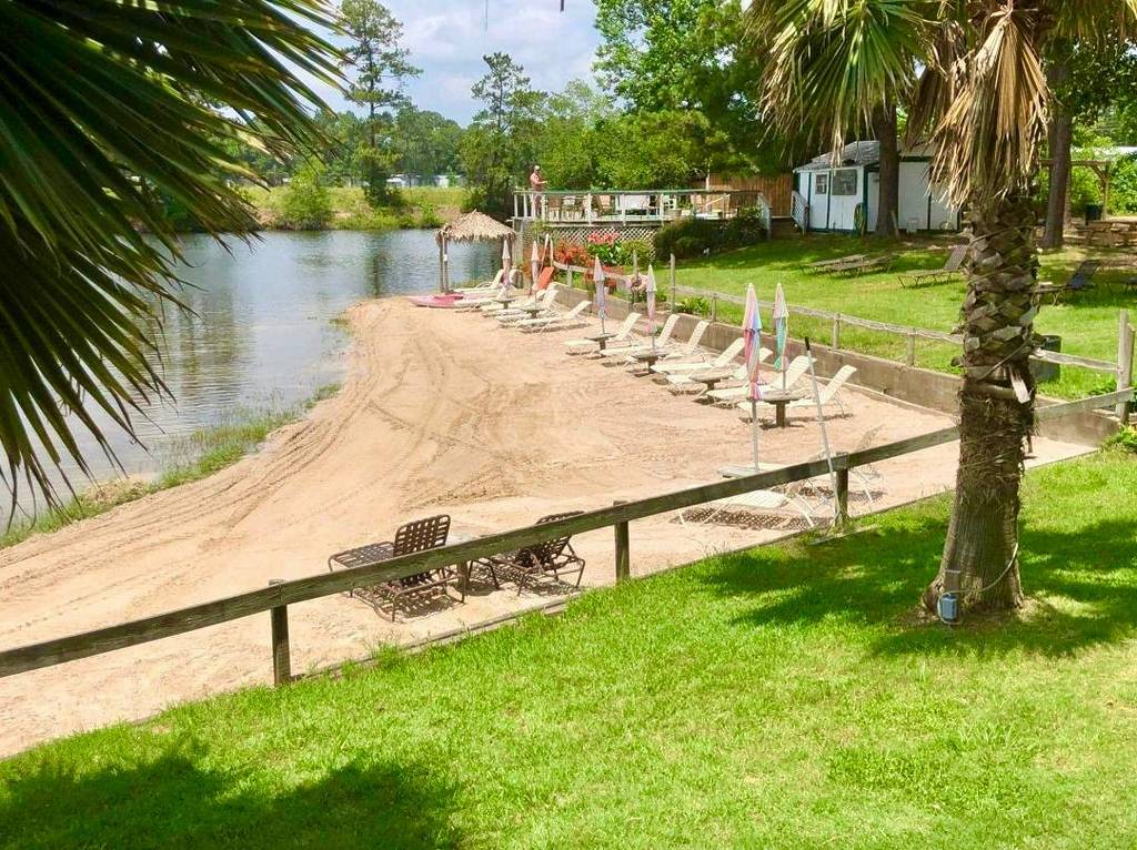 Image shows the nude beach at Emerald Lakes Nature Resort in Houston.