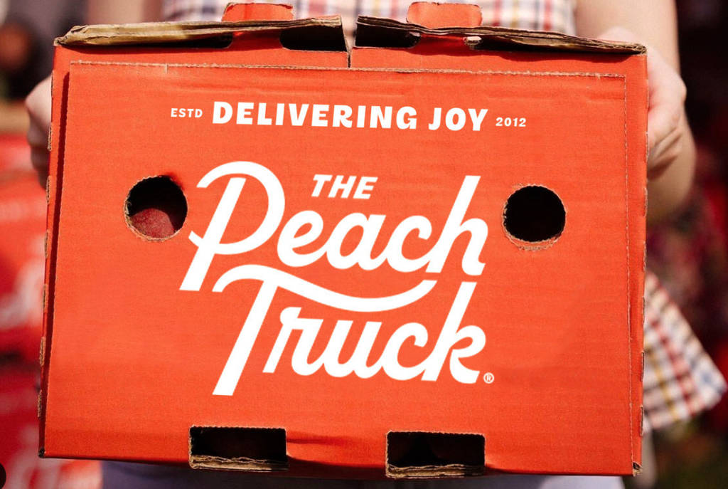 Image shows a box from The Peach Truck