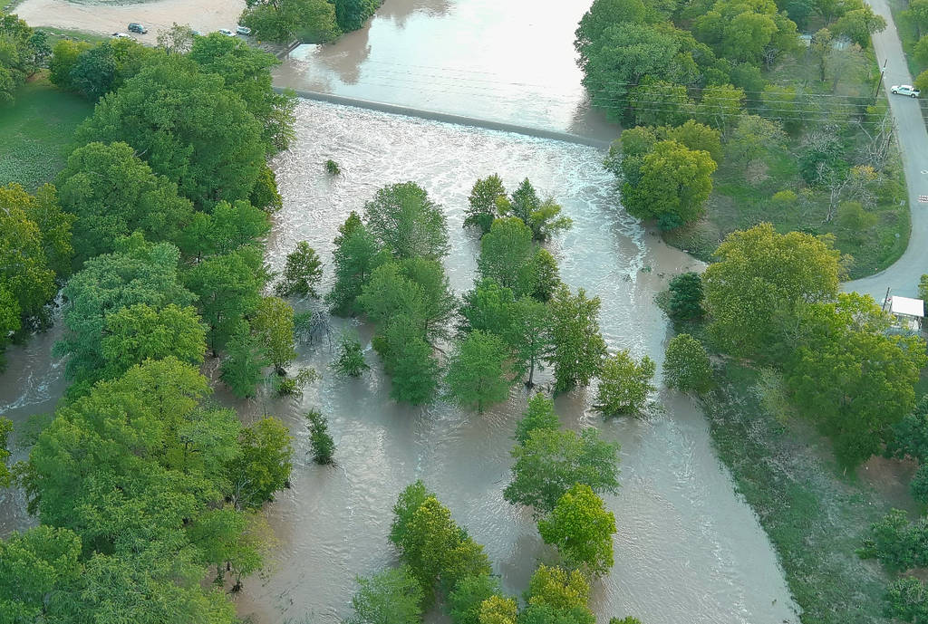 Image shows flooding of the Guadalupe River in Texas.