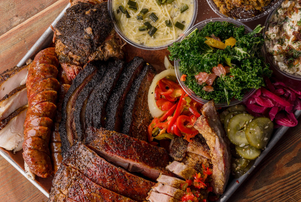 Image shows a plate of barbecue from Truth BBQ in Houston