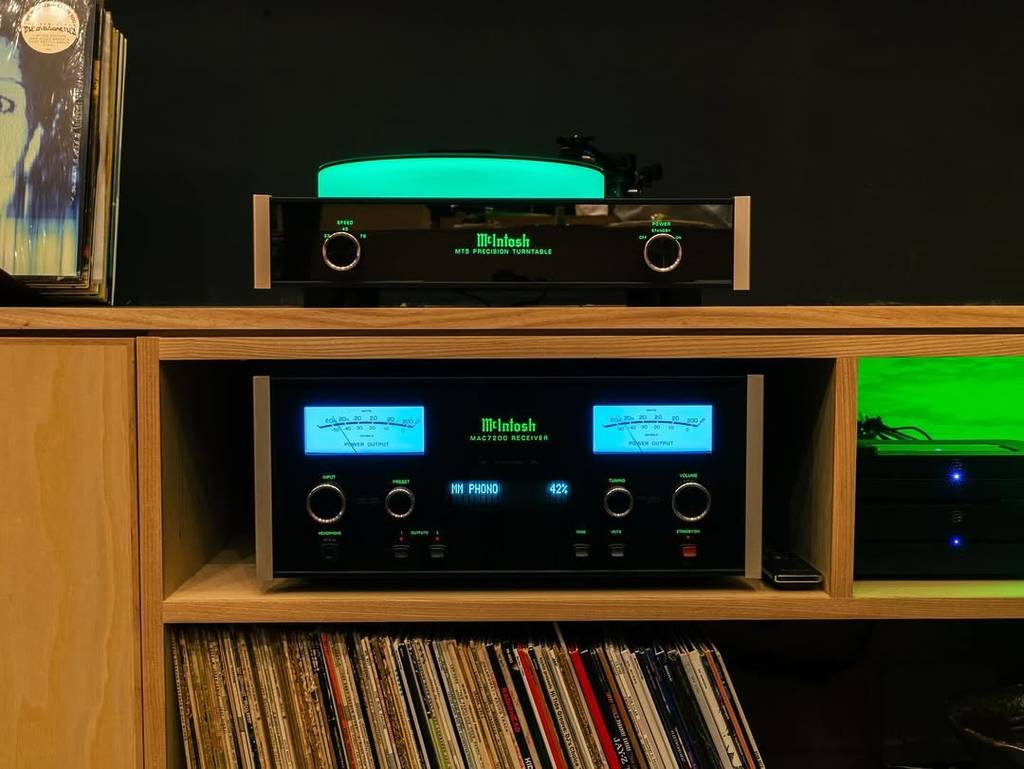 Image shows the Mackintosh turn table and record collection at Kira restaurant in Houston.