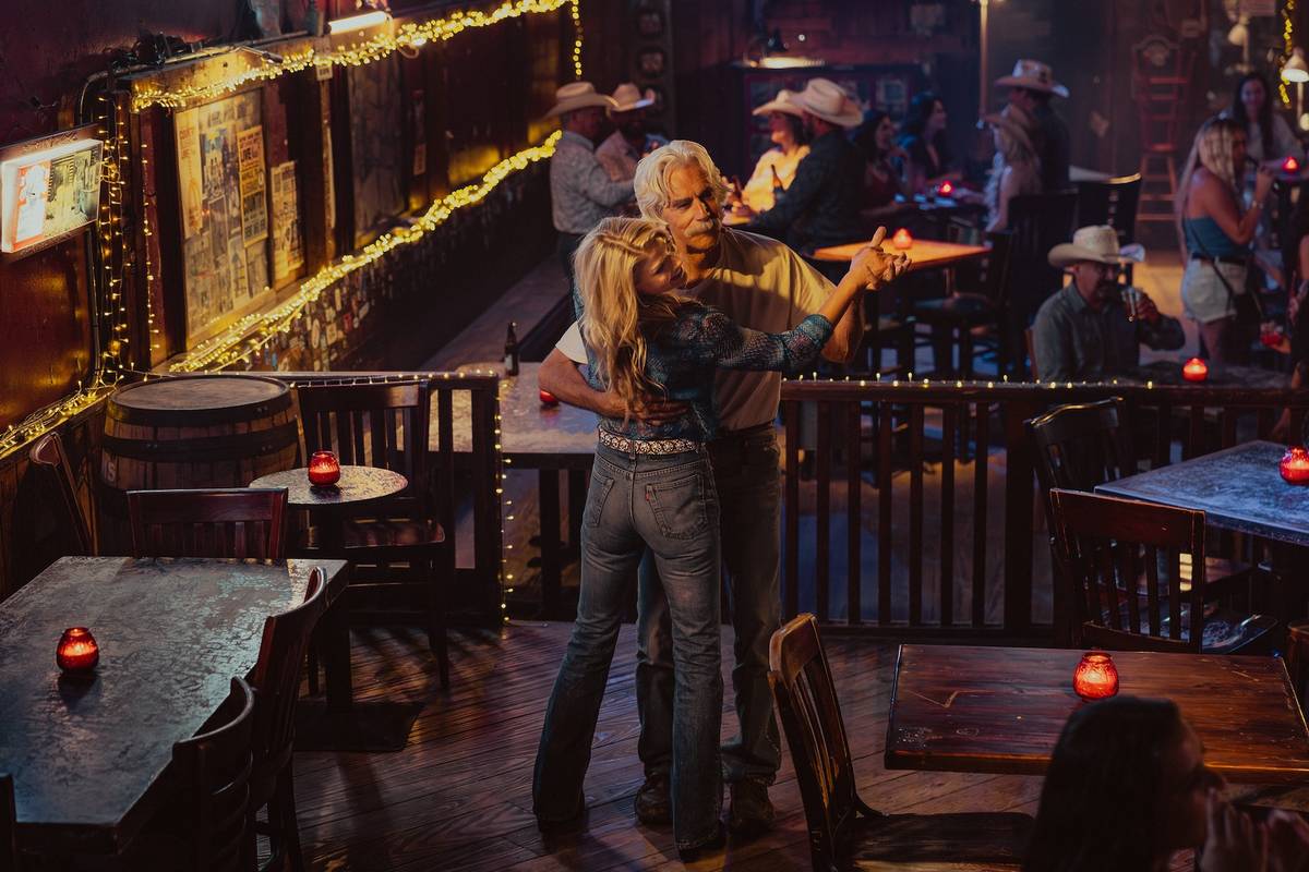 Ali Larter as Angela Norris and Sam Elliott as T.L. in Landman episode 6, season 2, streaming on Paramount+.