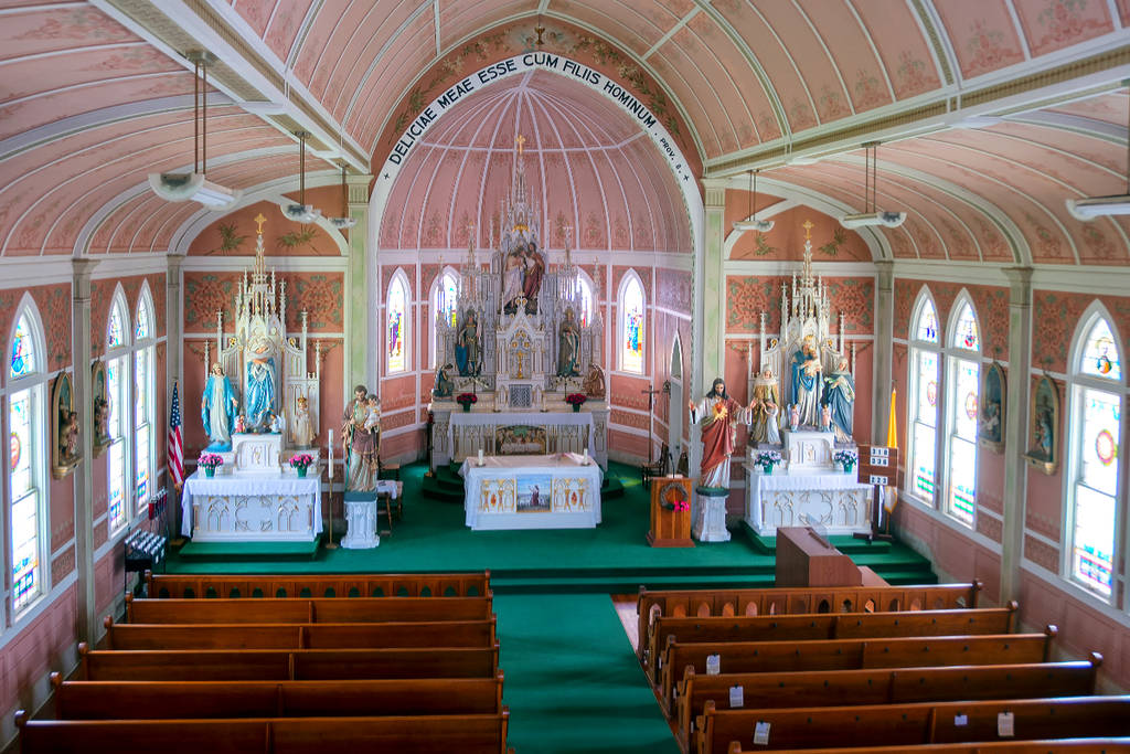 Image shows the St. John the Baptist Catholic Church interior in Ammannsville.