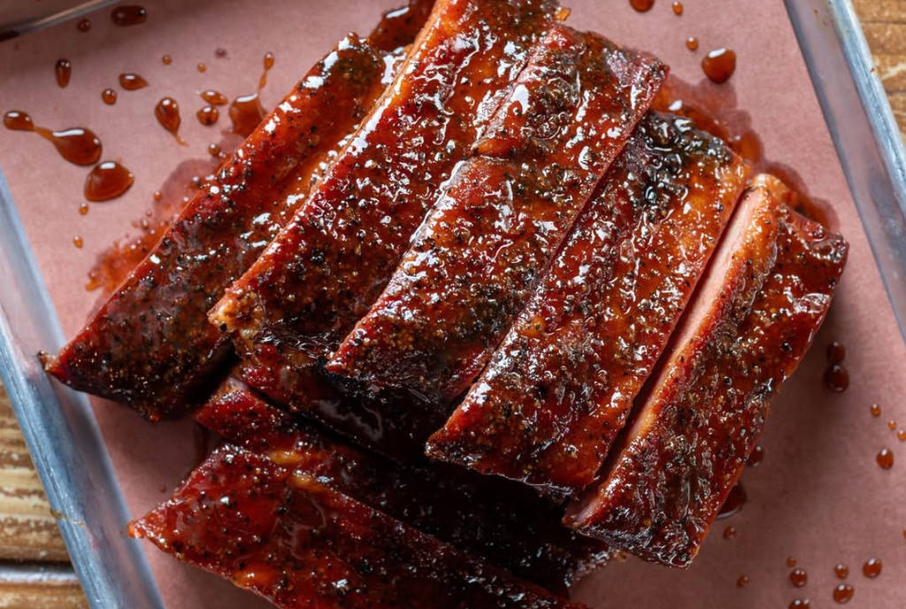Image shows a plate of barbecue from Pinkerton's Barbecue.