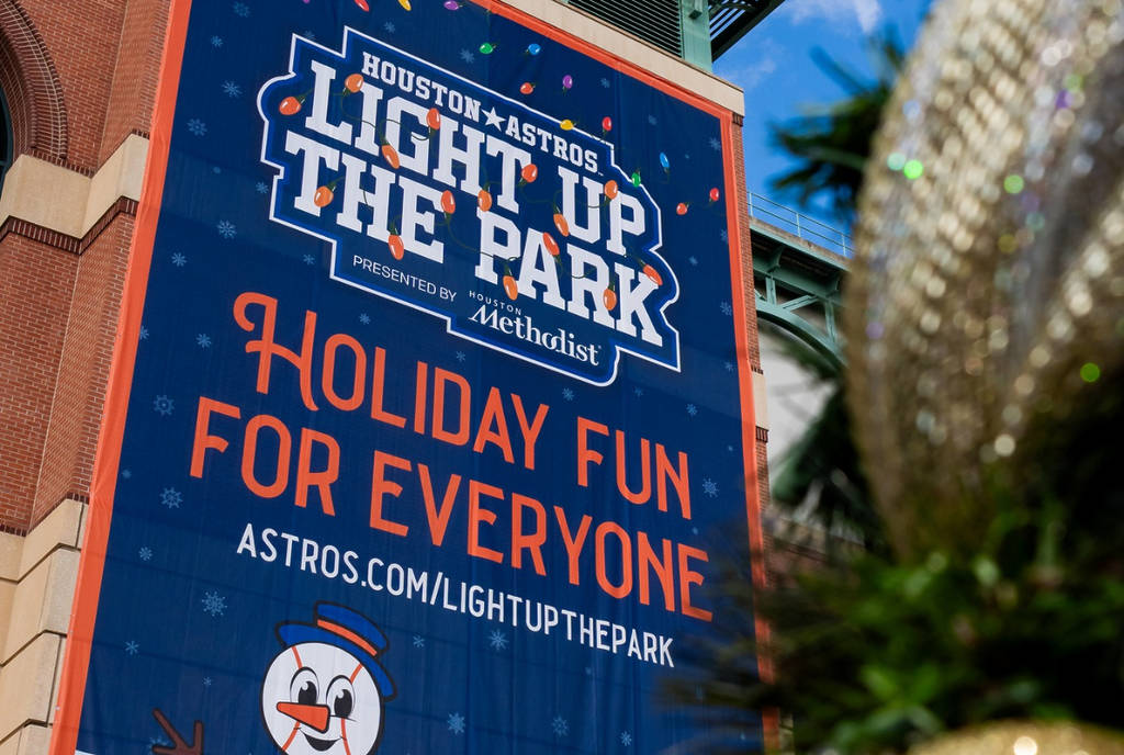 Image shows the banner for Light Up The Park at Daikin Park in Houston.