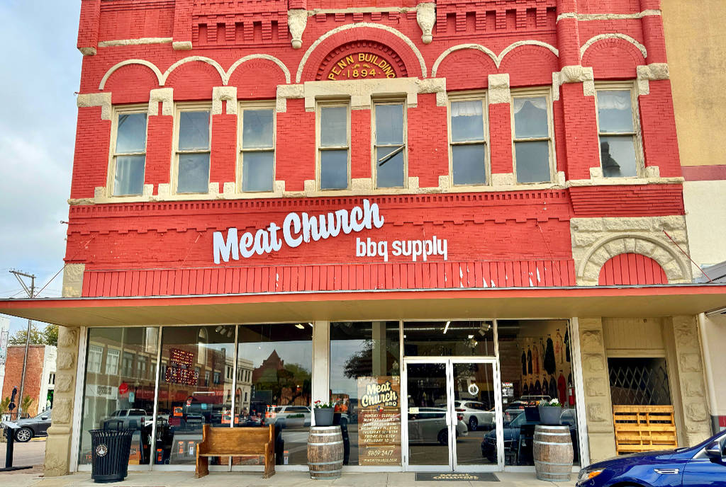 Image shows the front facade of Meat Church BBQ in Waxahachie, Texas.