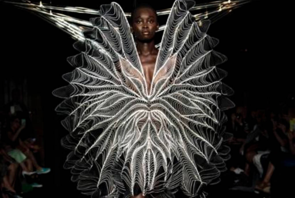 Image shows Iris Van Herpen, Syntopia Dress, Haute modeled by Sabah Koj..