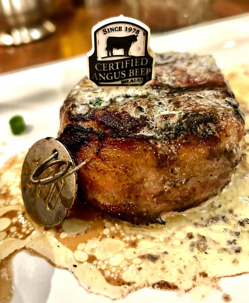 Image shows a 6-oz filet with a Certified Angus Beef Brand tag.