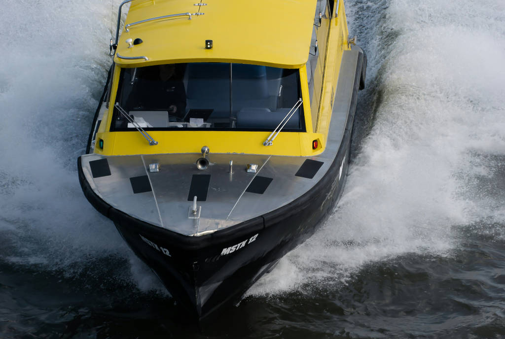 Image shows the front side of a water taxi.