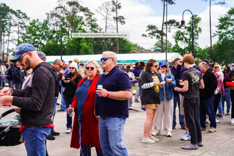 Image shows a crowd of people in attendance of the Houston Barbecue Fest. 