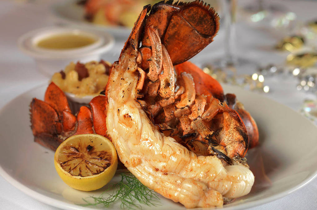 Image shows a seafood dish at Fleming's Prime Steakhouse & Wine Bar. 