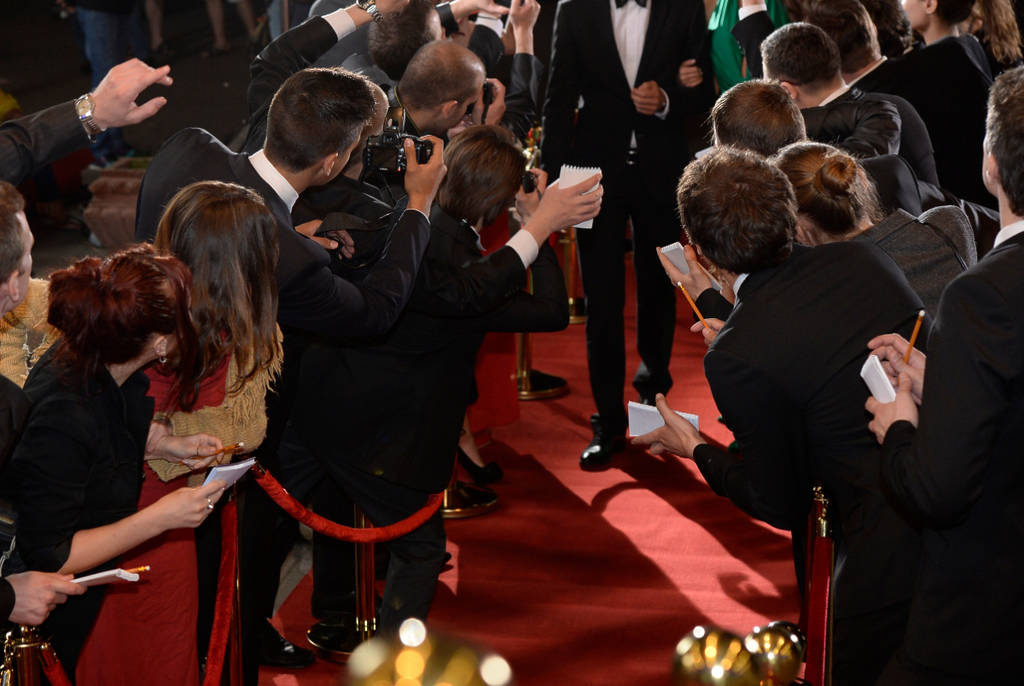 Image shows a red carpet event at a film festival.