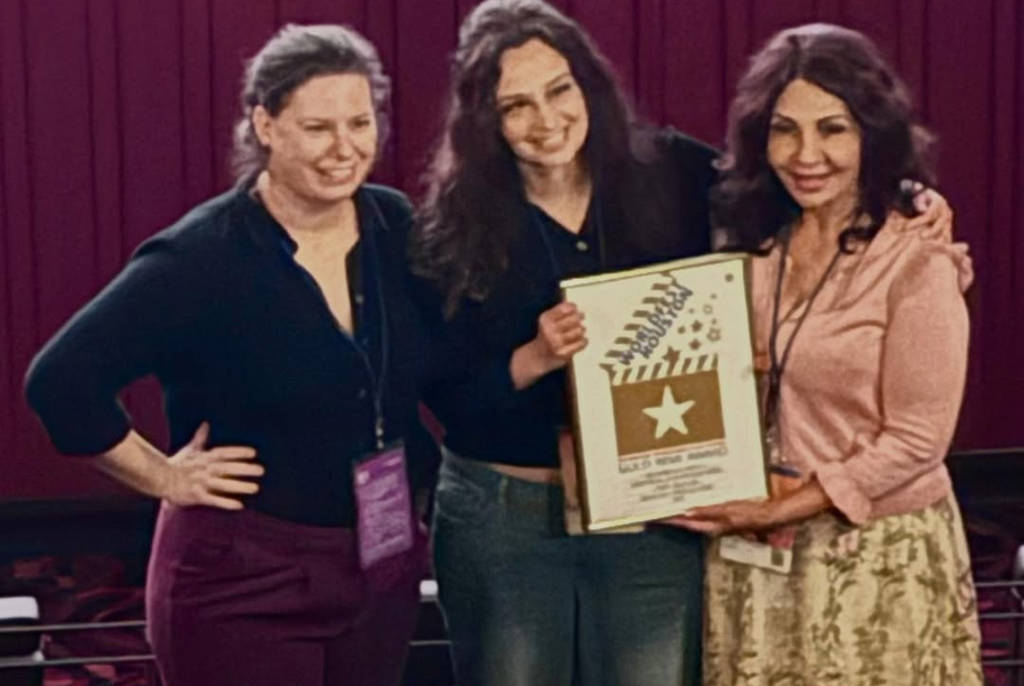 Image shows the winning filmmakers at WorldFest Houston's Remi Awards Dinner.