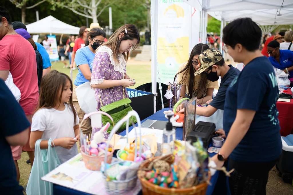 Image shows a vendor at Discovery Green's Earth Day celebration.