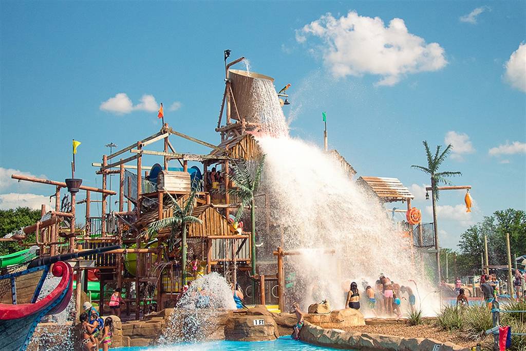 Image shows a water playground at Splash Town waterpark.