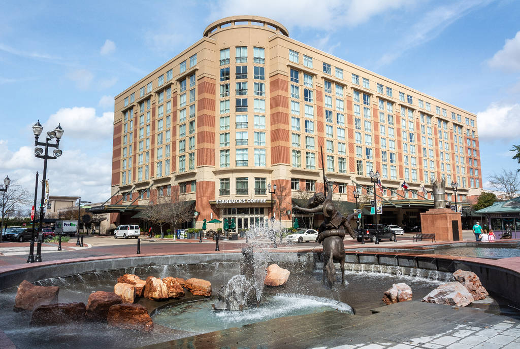 Image shows a building and fountain in Sugar Land, Texas.
