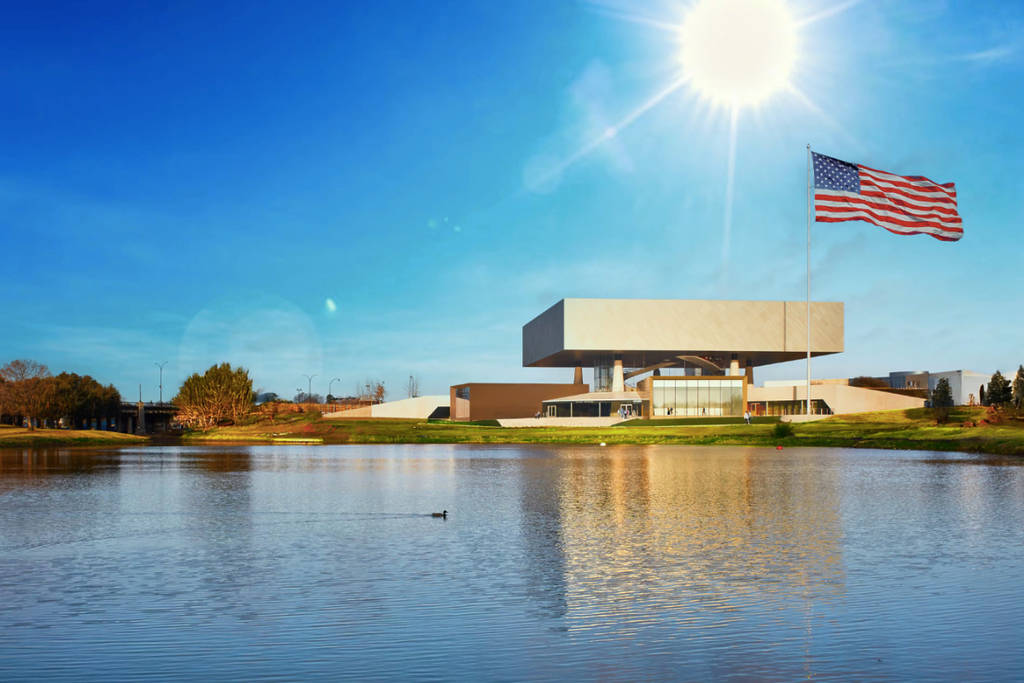 Image shows the National Medal of Honor Museum from across a body of water.