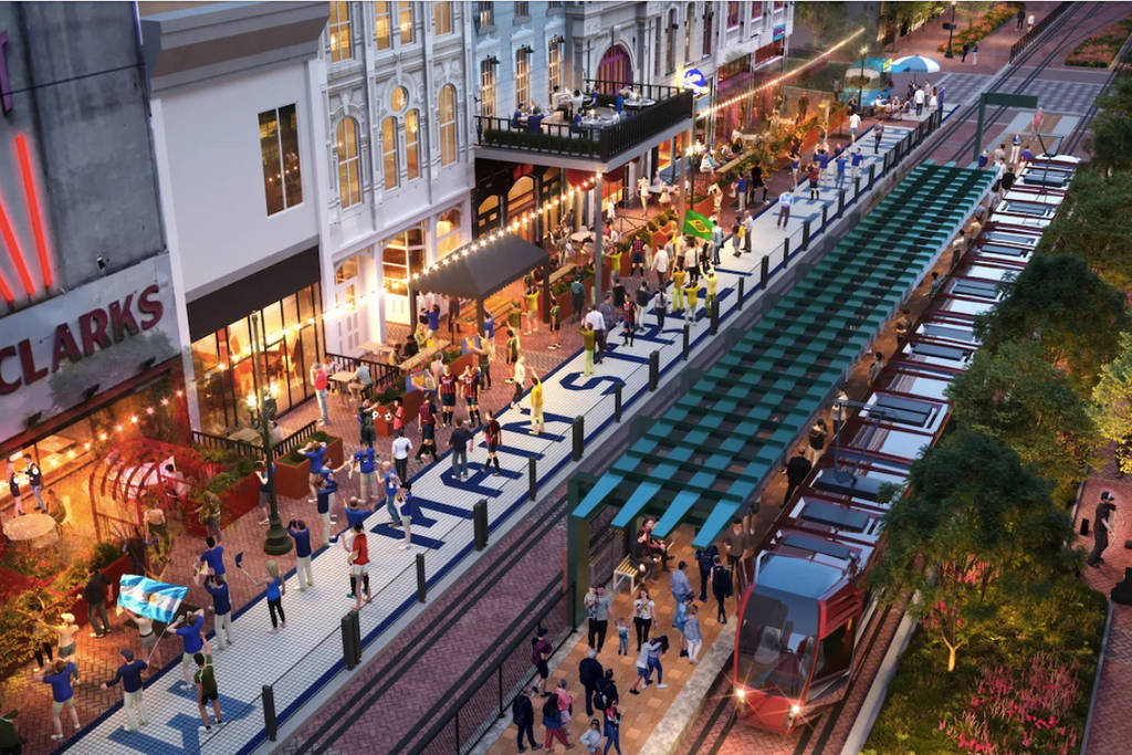 Photo shows the Main Street Promenade in Houston at evening hours.