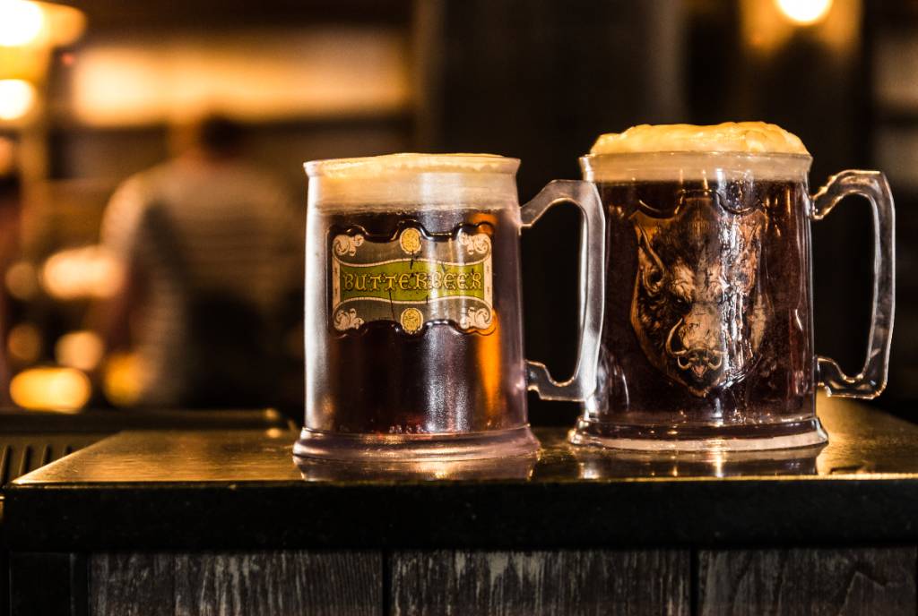 Image shows two glasses of butterbeer. 