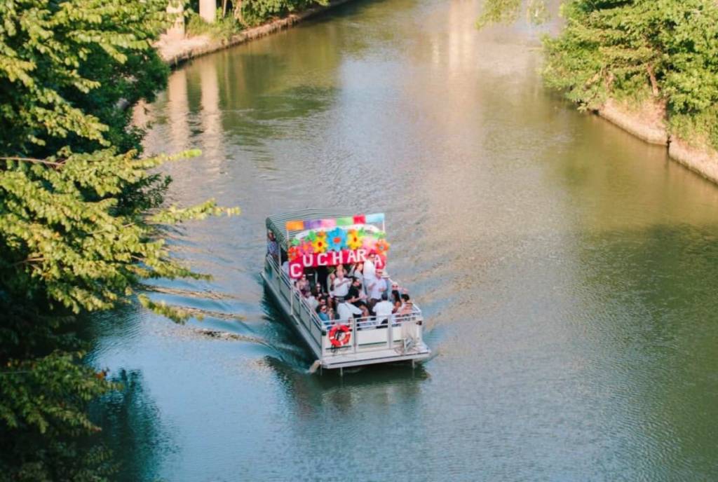 Image shows Cuchara's Mexico City-inspired boat cruise in Houston from an aerial point of view.
