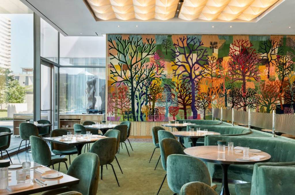 Image shows the dining space at Le Jardinier in Houston.
