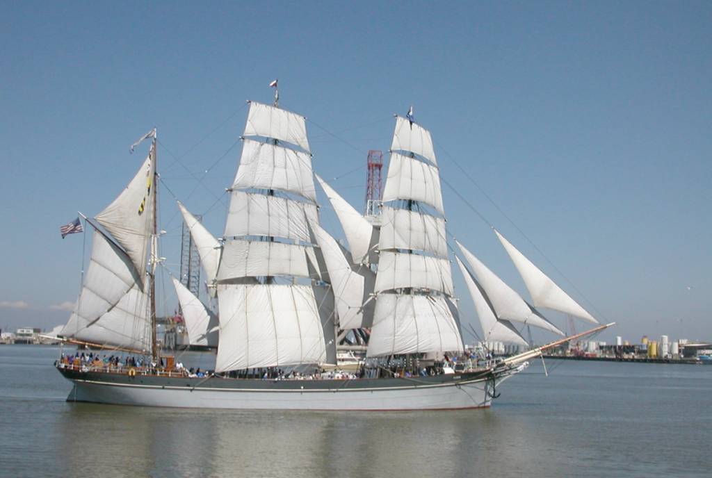 Image shows the Tall Ship ELISSA sailing in open waters. 