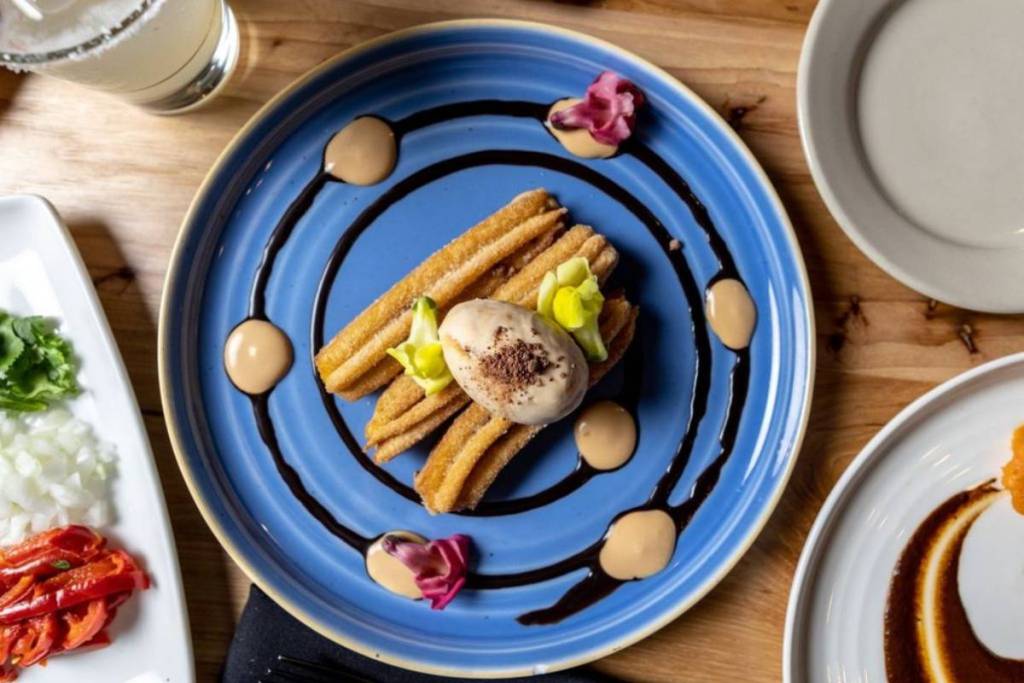Image shows a plate of Mexican cuisine as served at Hugo's. 