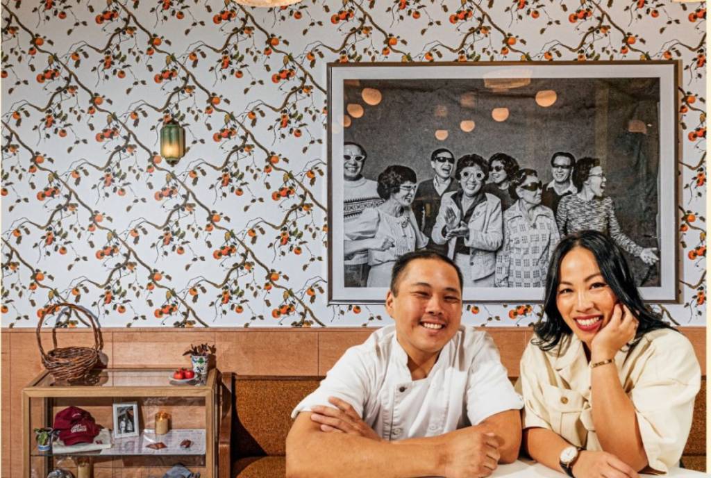 Image shows owners of Agnes & Sherman posing for a photograph.